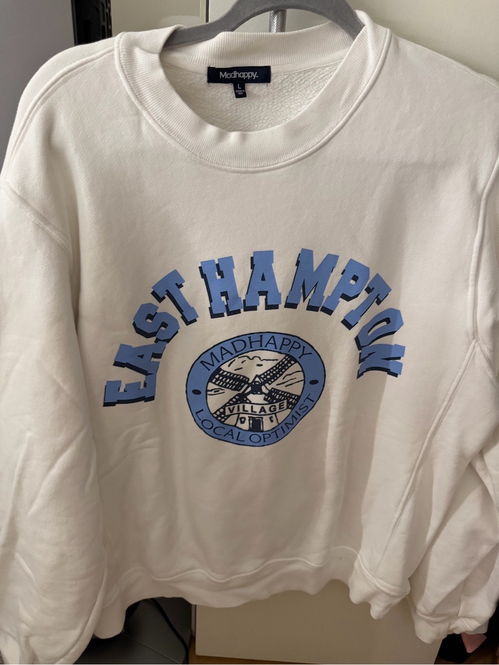 Madhappy White Sweatshirt with Light Blue East Hampton Graphic